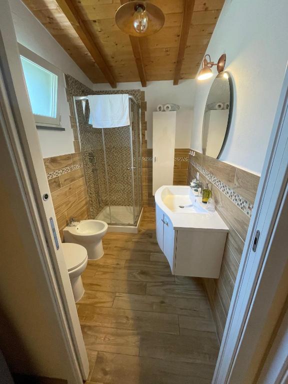 a bathroom with a sink and a toilet and a shower at My Bnb Pisa in Pisa
