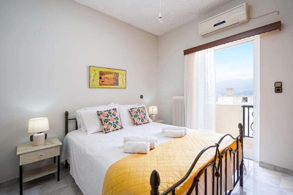 Postel nebo postele na pokoji v ubytování Cozy Apartment 2