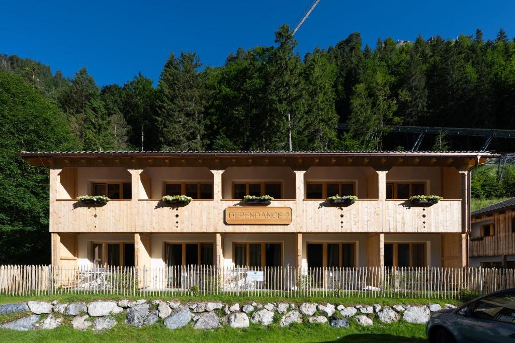 a building with a sign on the front of it at Hotel Gasthof Klause Dependance 2 in Reutte