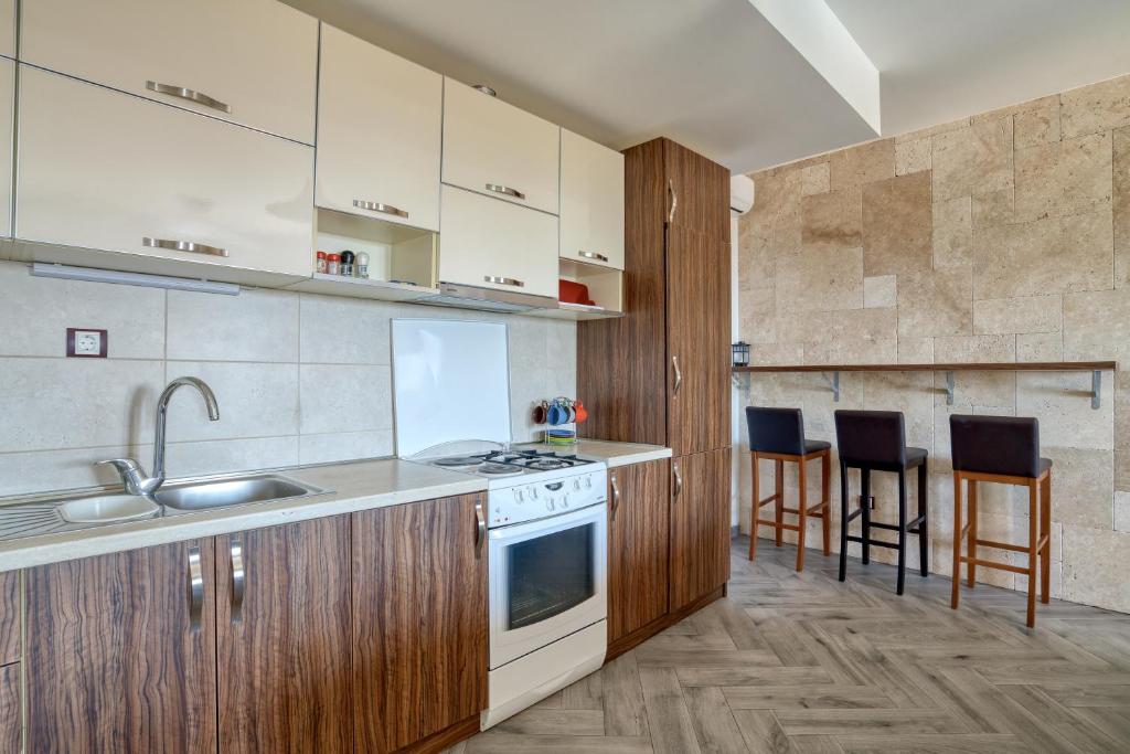 Kuchyň nebo kuchyňský kout v ubytování Villa Old Olive