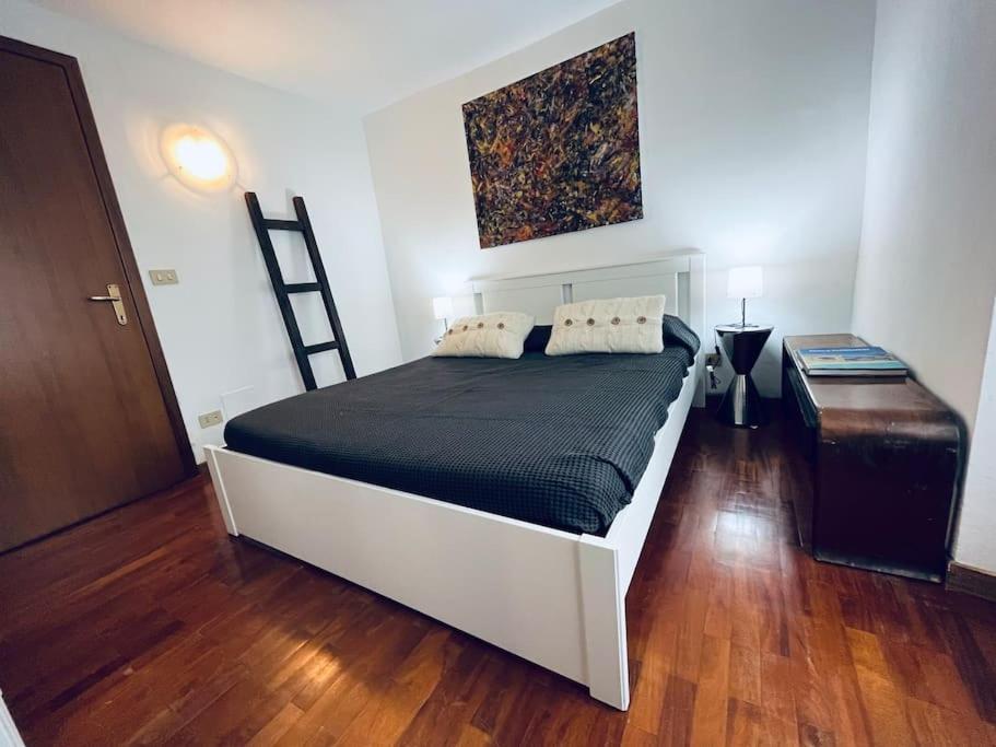 Posteľ alebo postele v izbe v ubytovaní Attico Porta Nuova, Torino Centro