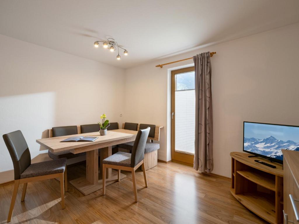 Televízia a/alebo spoločenská miestnosť v ubytovaní Appartement Elisabeth