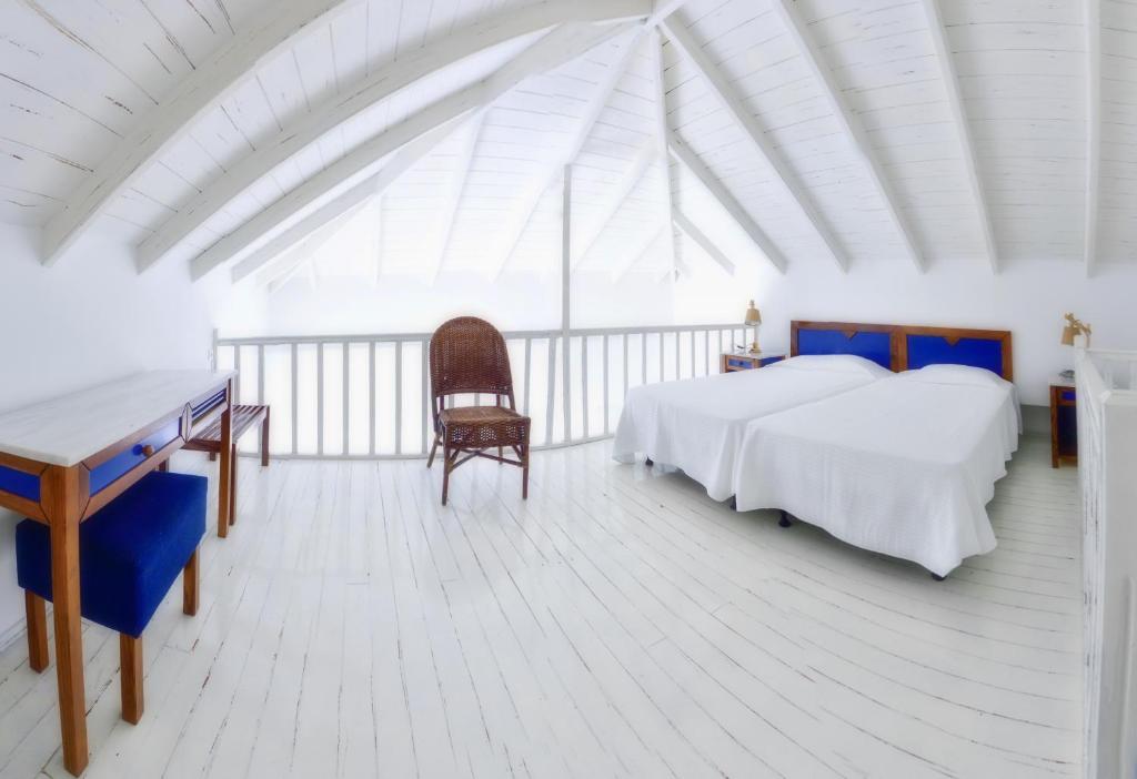 Posteľ alebo postele v izbe v ubytovaní Kalidon beach Hotel