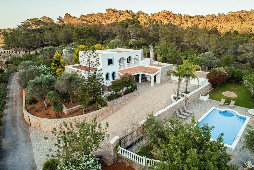 an aerial view of a house with a swimming pool at Finca Norte, Amazing villa close to the best Beaches in Portinatx