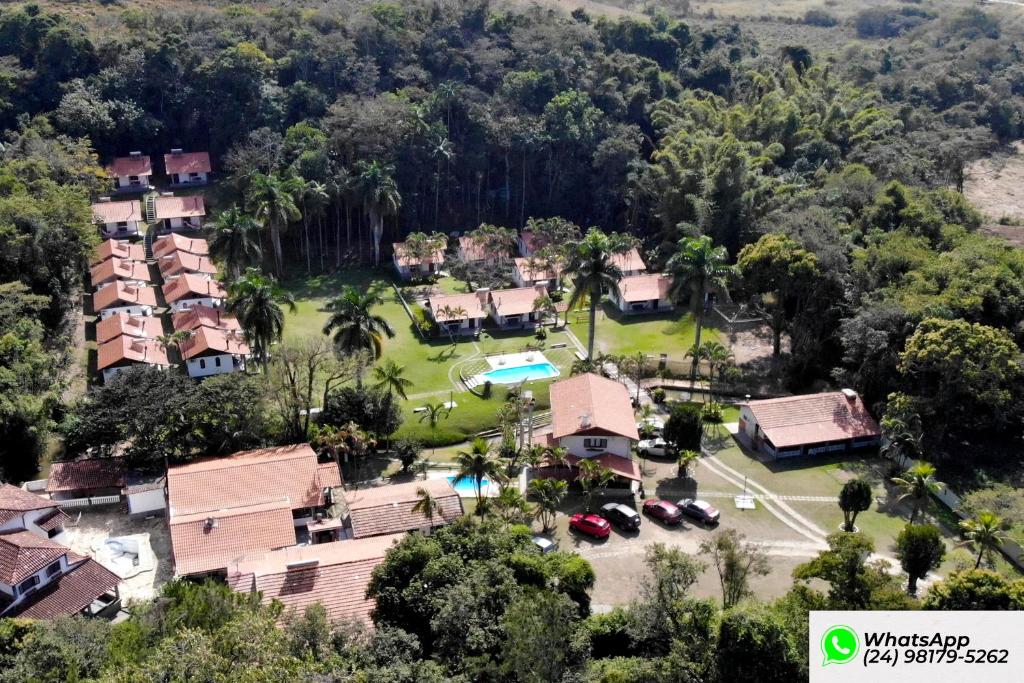 an aerial view of a house with a yard at Pousada Tapera in Penedo