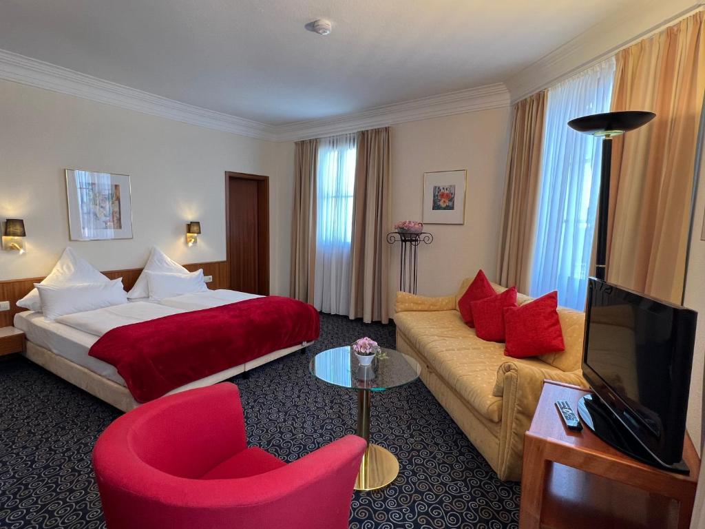 TV a/nebo společenská místnost v ubytování Stadthotel