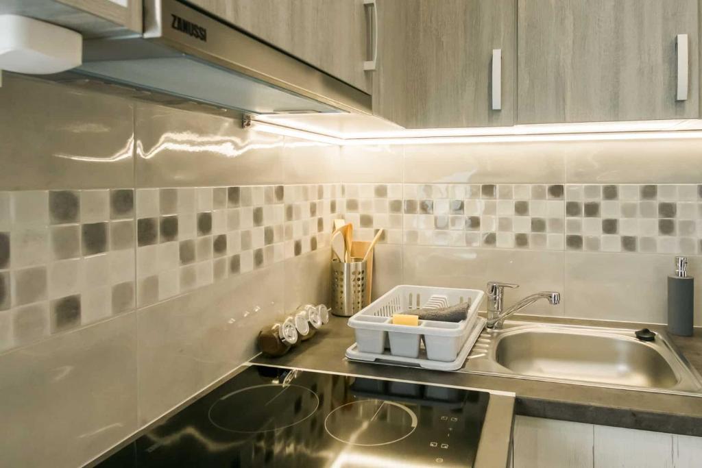 Kuchyňa alebo kuchynka v ubytovaní Dévai-LUX Apartman Sárvár