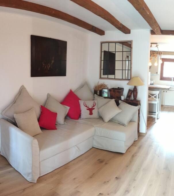 Posezení v ubytování Cozy apartment in the heart of the Alps