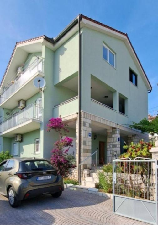 a car parked in front of a building at Klementina in Mali Lošinj