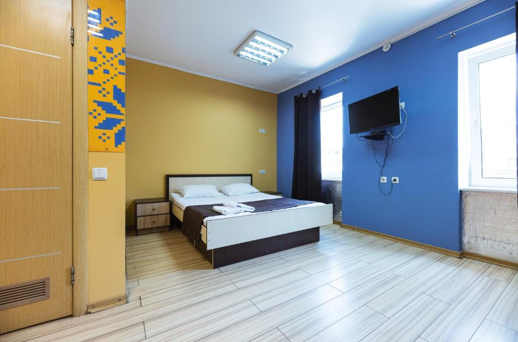 Postel nebo postele na pokoji v ubytování Guest house "Golden Gate 911 "