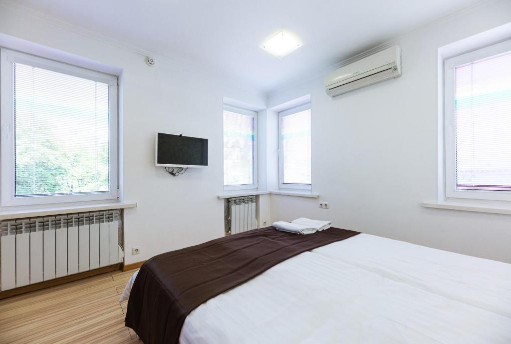 Postel nebo postele na pokoji v ubytování Guest house "Golden Gate 911 "