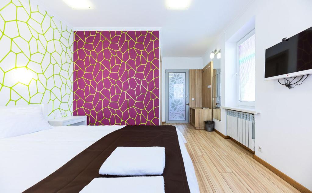 Postel nebo postele na pokoji v ubytování Guest house "Golden Gate 911 "