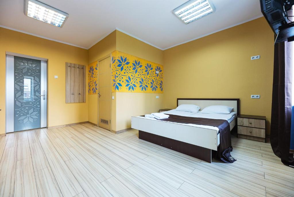 Postel nebo postele na pokoji v ubytování Guest house "Golden Gate 911 "