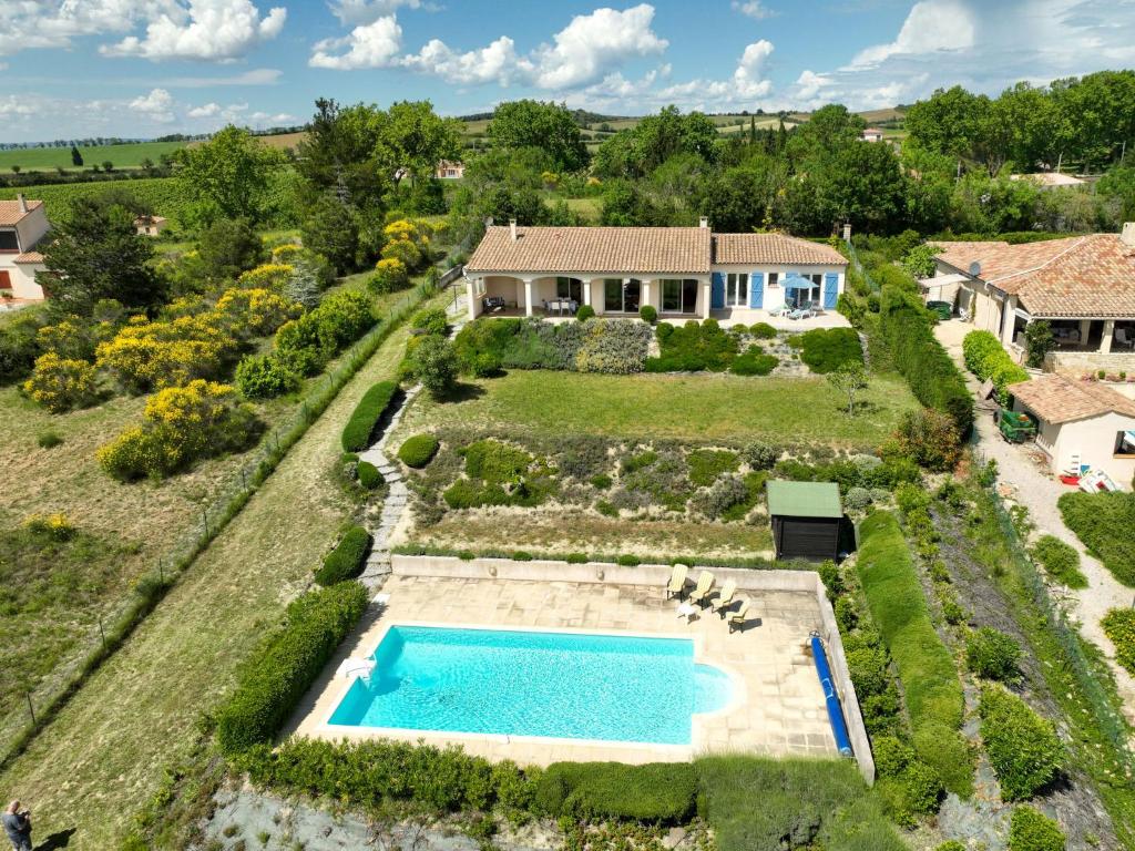 an aerial view of a villa with a swimming pool at Holiday Home Le Rossignol by Interhome in Cailhau