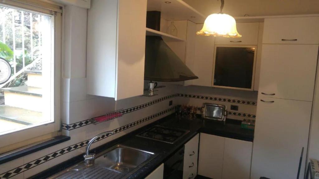Kuchyň nebo kuchyňský kout v ubytování Casa Carla