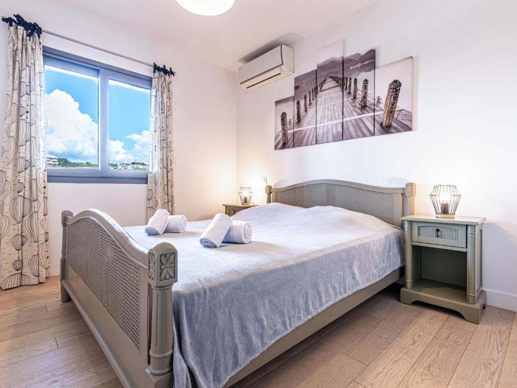 Cama o camas de una habitación en Apartment Résidence Cita di Sali-13 by Interhome