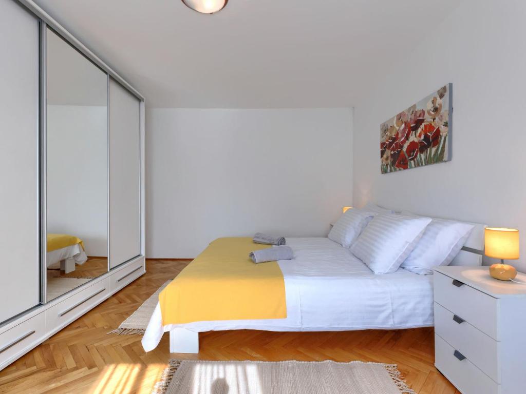 Postel nebo postele na pokoji v ubytování Holiday Home Reaa by Interhome