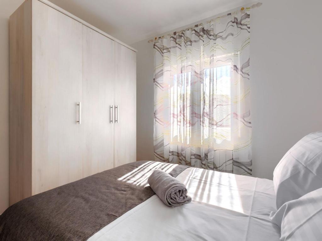 Postel nebo postele na pokoji v ubytování Holiday Home Reaa by Interhome