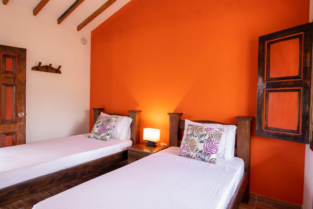 Postel nebo postele na pokoji v ubytování HOTEL YANUBA CAMPESTRE