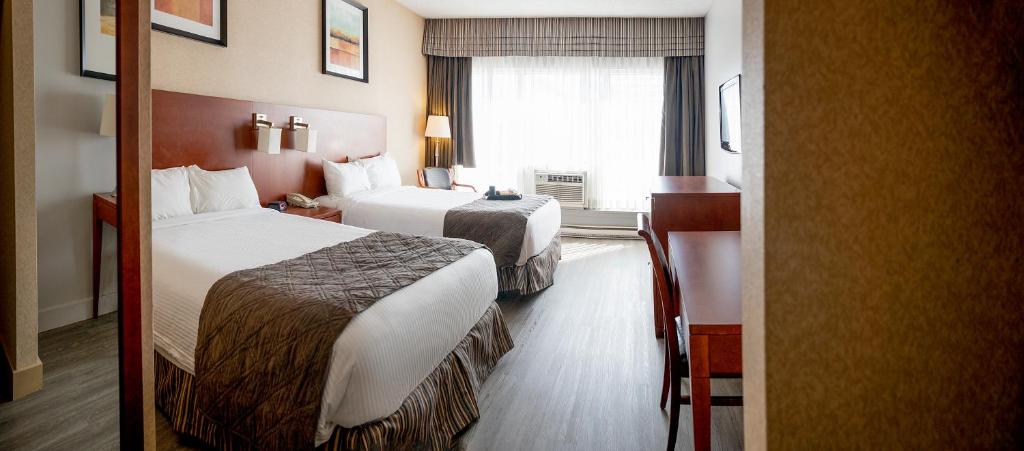 
Select Two Double Beds Room
