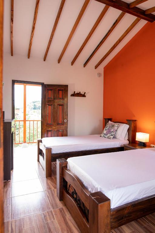 Postel nebo postele na pokoji v ubytování HOTEL YANUBA CAMPESTRE