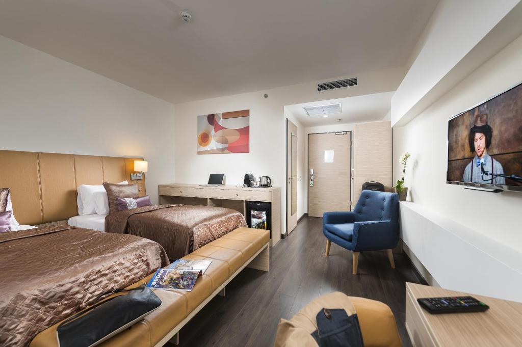 Postel nebo postele na pokoji v ubytování Bo33 Hotel Family & Suites