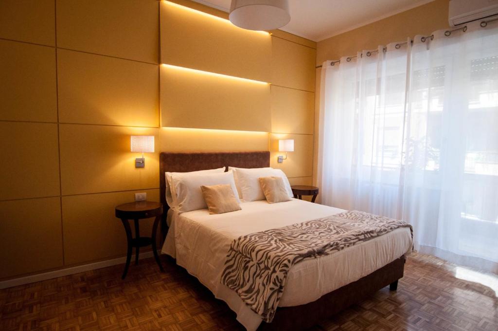 A bed or beds in a room at B&B Roma 474