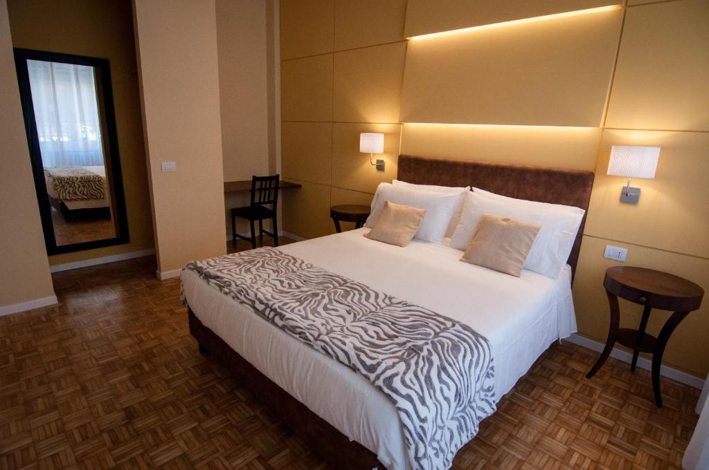 A bed or beds in a room at B&B Roma 474