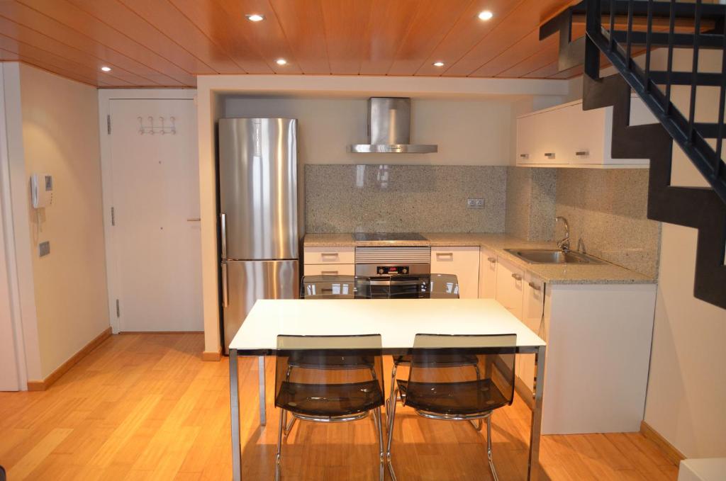 Kuchyňa alebo kuchynka v ubytovaní Girona Housing Ginesta 9