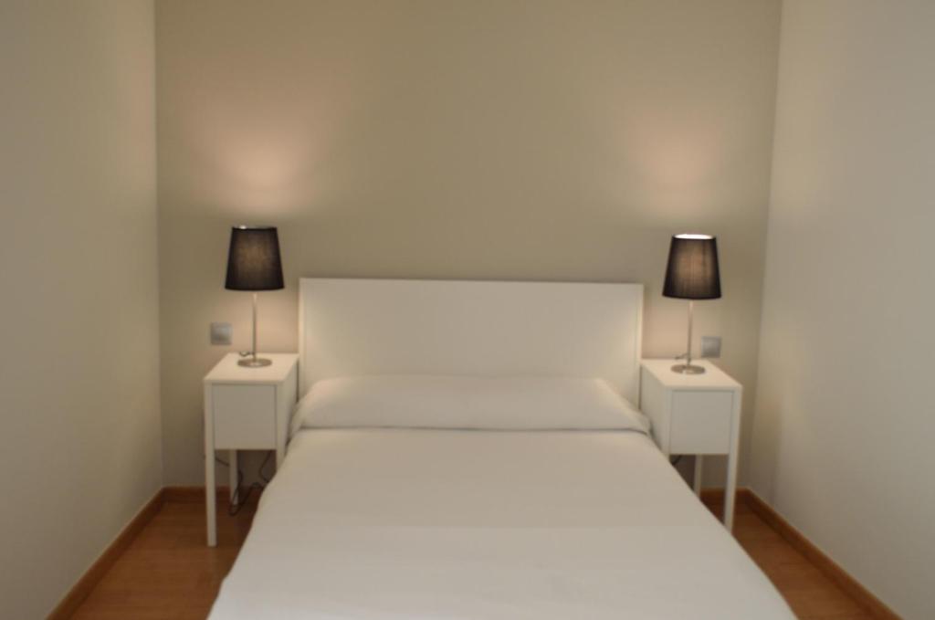 Posteľ alebo postele v izbe v ubytovaní Girona Housing Ginesta 9