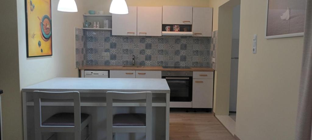 Fotografie z fotogalerie ubytování Apartment in Ražanj with Terrace, WIFI, Washing machine, Dishwasher (3743-3) v destinaci Ražanj