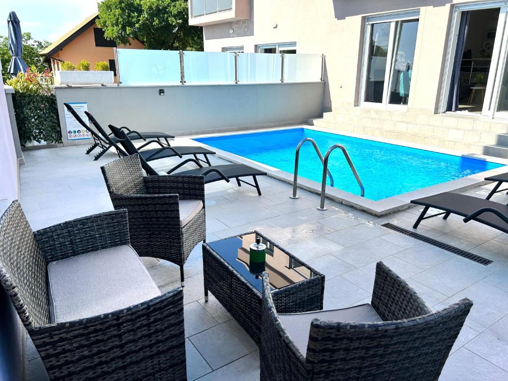 Bazén v ubytování Holiday house "Sabine green" nebo v jeho okolí