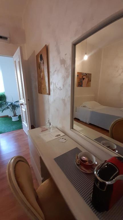Postel nebo postele na pokoji v ubytování SUITE OF KLIMT