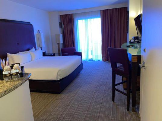 Ein Bett oder Betten in einem Zimmer der Unterkunft Hard Rock Hotel &amp; Casino Biloxi