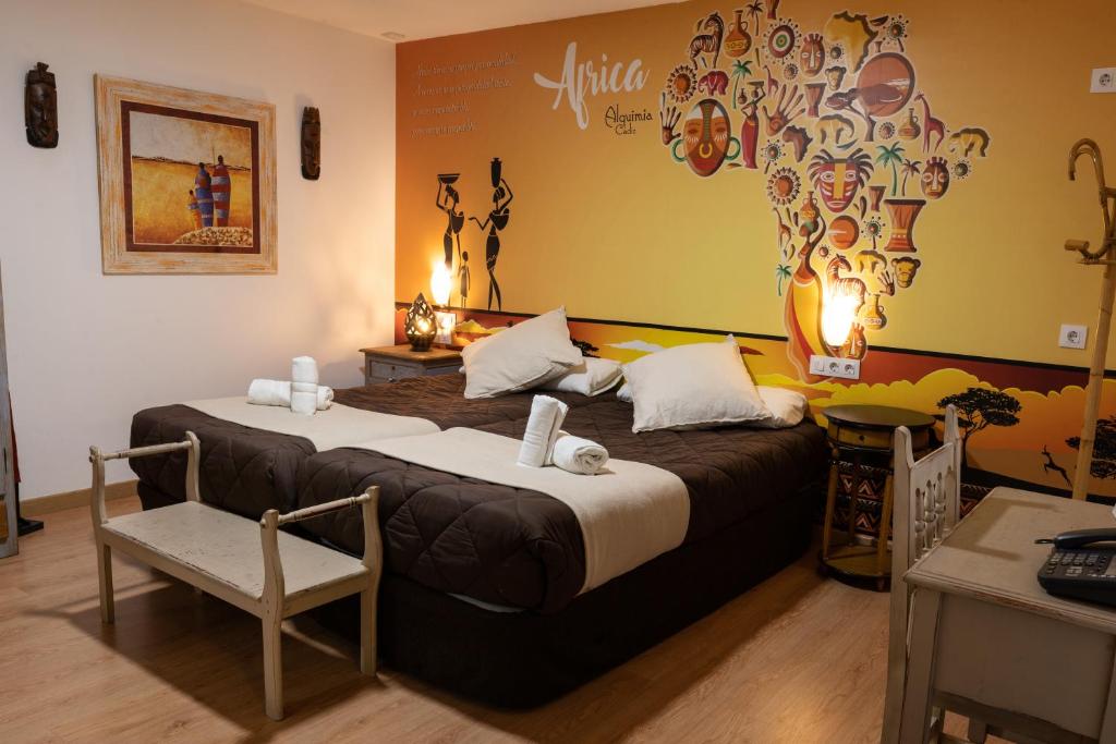 Postel nebo postele na pokoji v ubytování Hotel Alquimia Cadiz