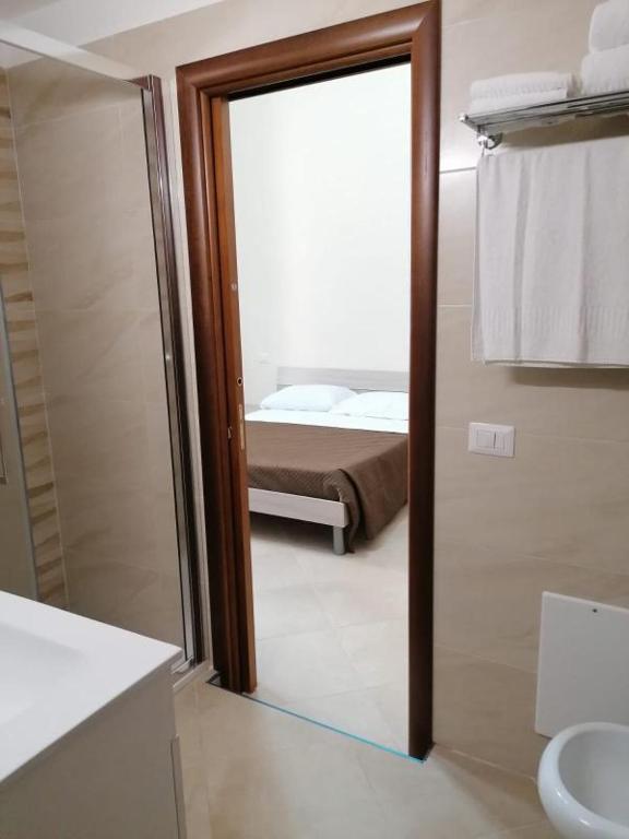 Postel nebo postele na pokoji v ubytování Il Cantuccio b&b