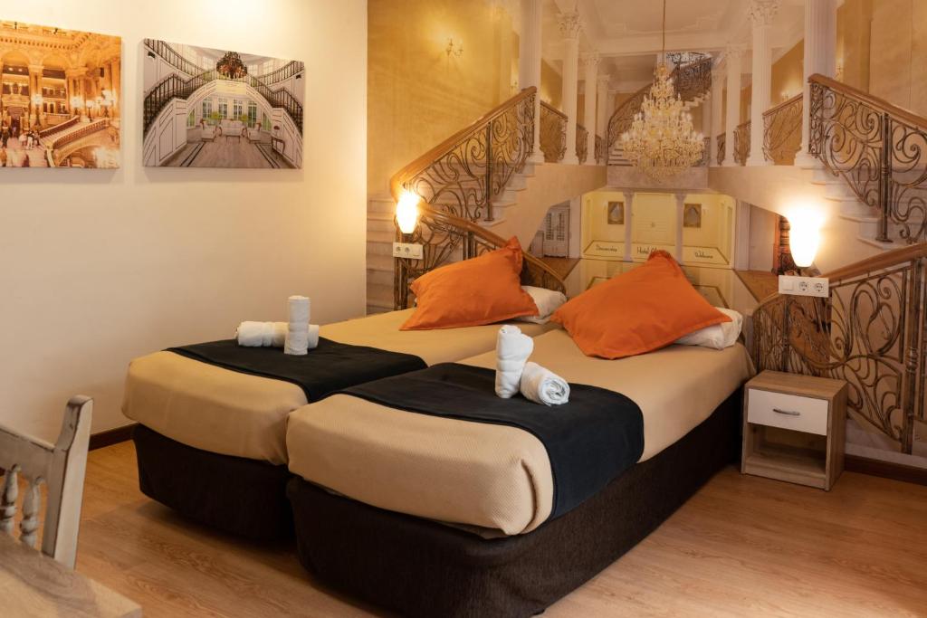 Postel nebo postele na pokoji v ubytování Hotel Alquimia Cadiz