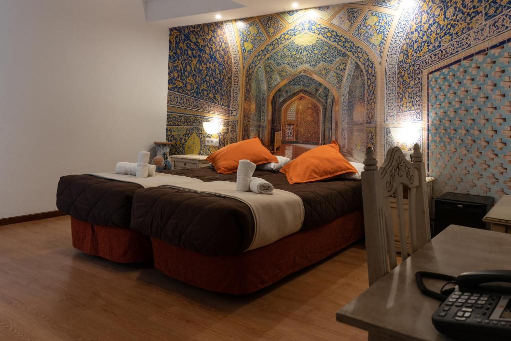 Postel nebo postele na pokoji v ubytování Hotel Alquimia Cadiz
