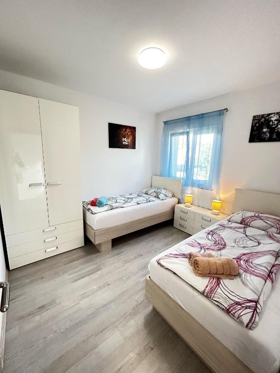 Postel nebo postele na pokoji v ubytování Holiday house "Sabine green"