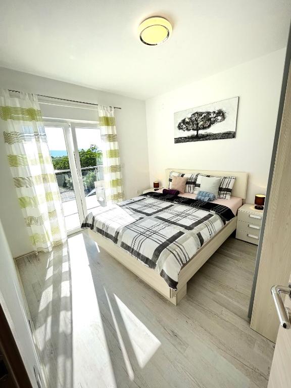 Postel nebo postele na pokoji v ubytování Holiday house "Sabine green"