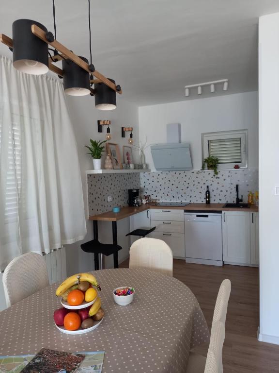 Kuchyň nebo kuchyňský kout v ubytování Apartman Betty
