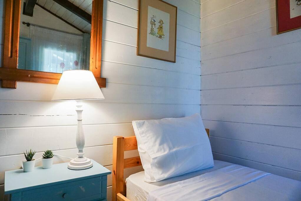Postel nebo postele na pokoji v ubytování SeaFront Villa Glaros