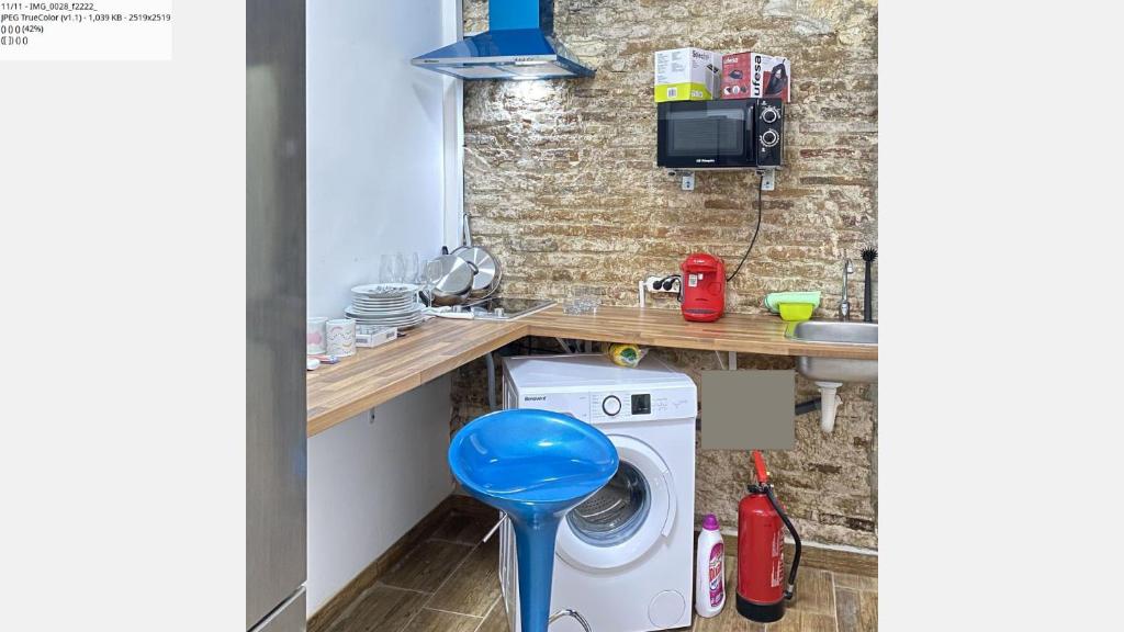 Kuchyň nebo kuchyňský kout v ubytování CAMP NOU & FiRA BUSINESS LOFTS