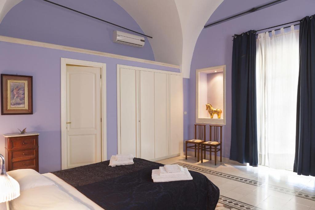 Postel nebo postele na pokoji v ubytování Villa Urso bed&breakfast