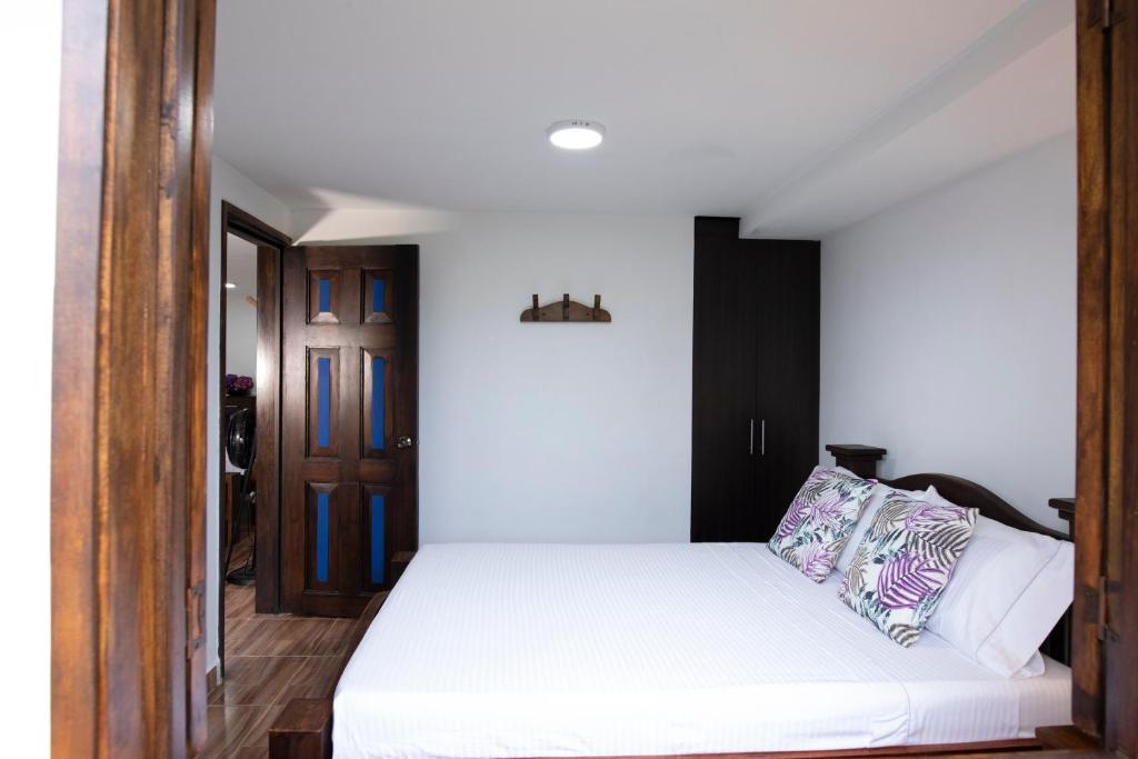Postel nebo postele na pokoji v ubytování HOTEL YANUBA CAMPESTRE