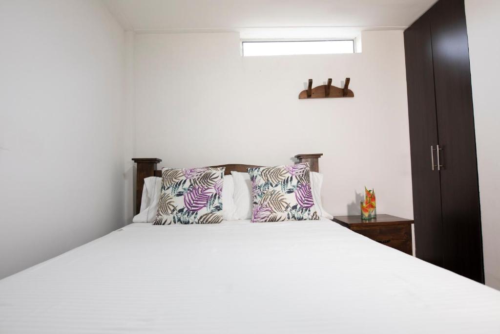 Postel nebo postele na pokoji v ubytování HOTEL YANUBA CAMPESTRE
