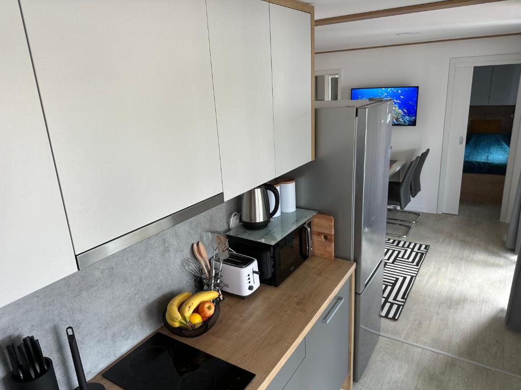 Kuchyň nebo kuchyňský kout v ubytování Mobile home Mare Blu