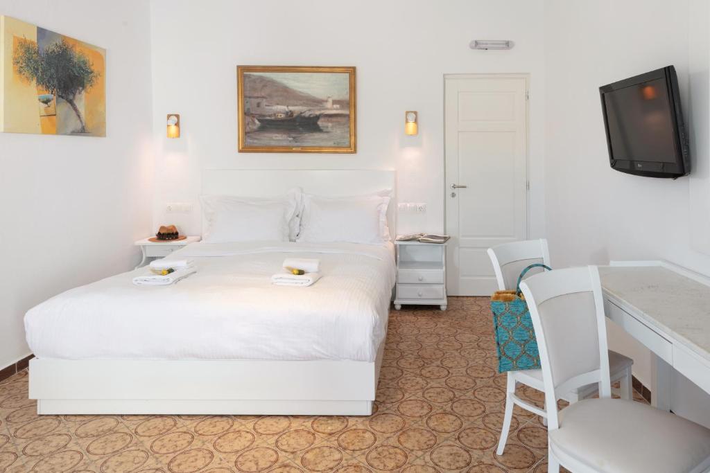 Postel nebo postele na pokoji v ubytování CORFOSTAR ROOMS