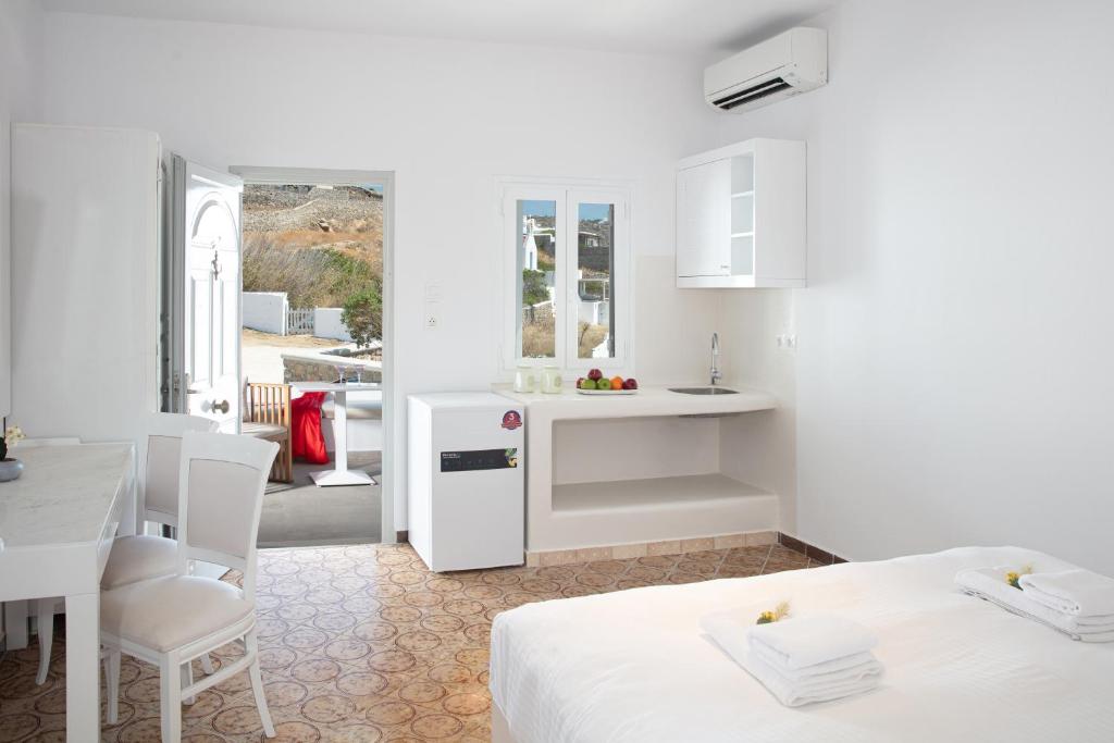 Kuchyň nebo kuchyňský kout v ubytování CORFOSTAR ROOMS
