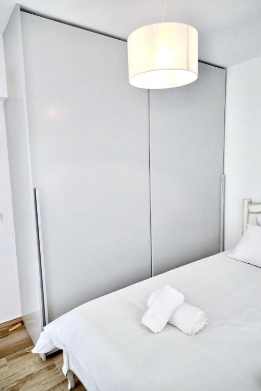 Postel nebo postele na pokoji v ubytování GK - Modern Apartment